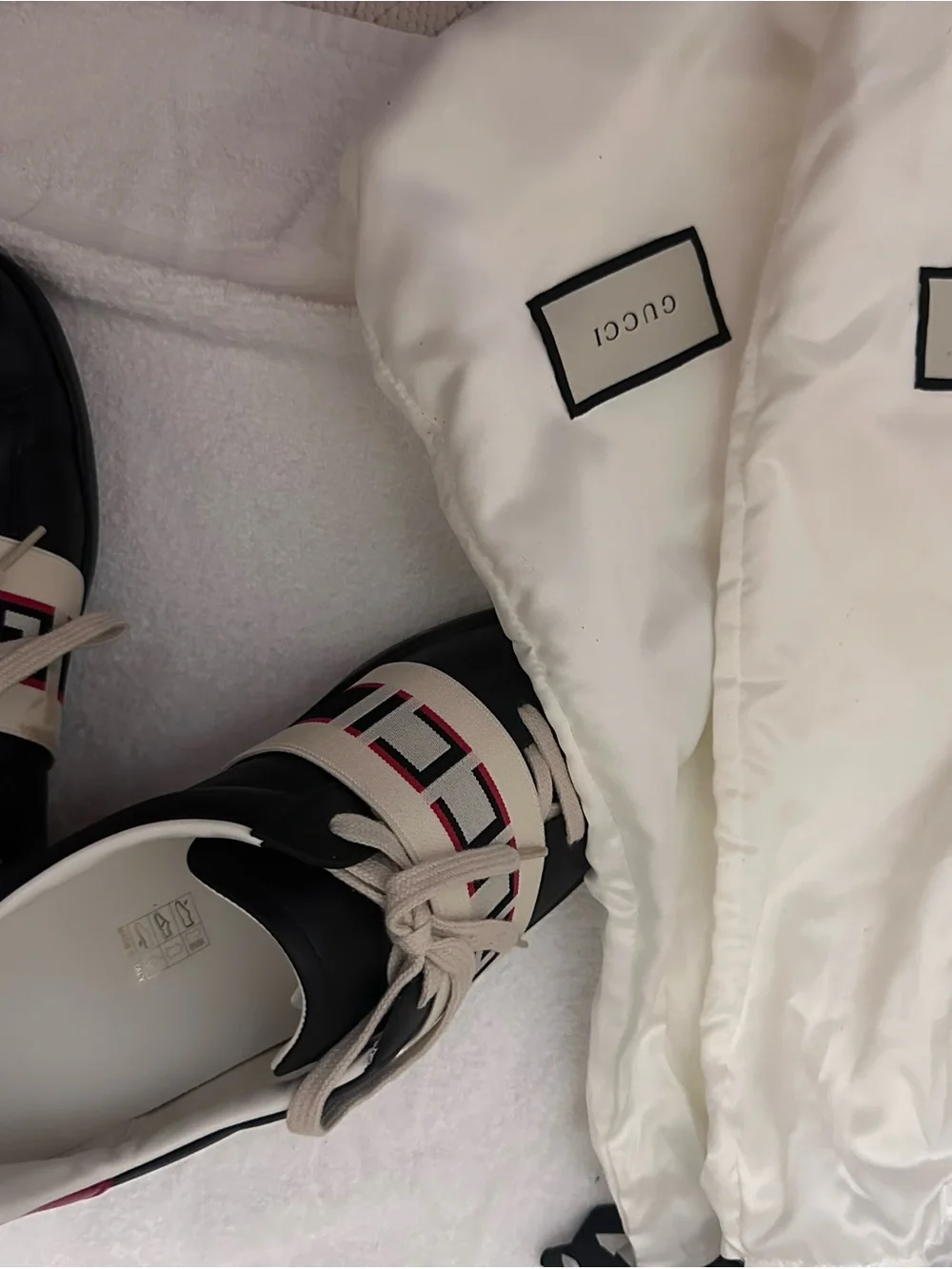 Gucci Black Leather Sneakers with Cream Strap and Red Accent